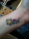color star tats on wrist